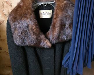 vintage black textured or bouclé coat with a brown fur collar and matching cuffs, featuring a "Nita Claire" label