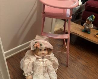 Vintage doll high chair and porcelain doll