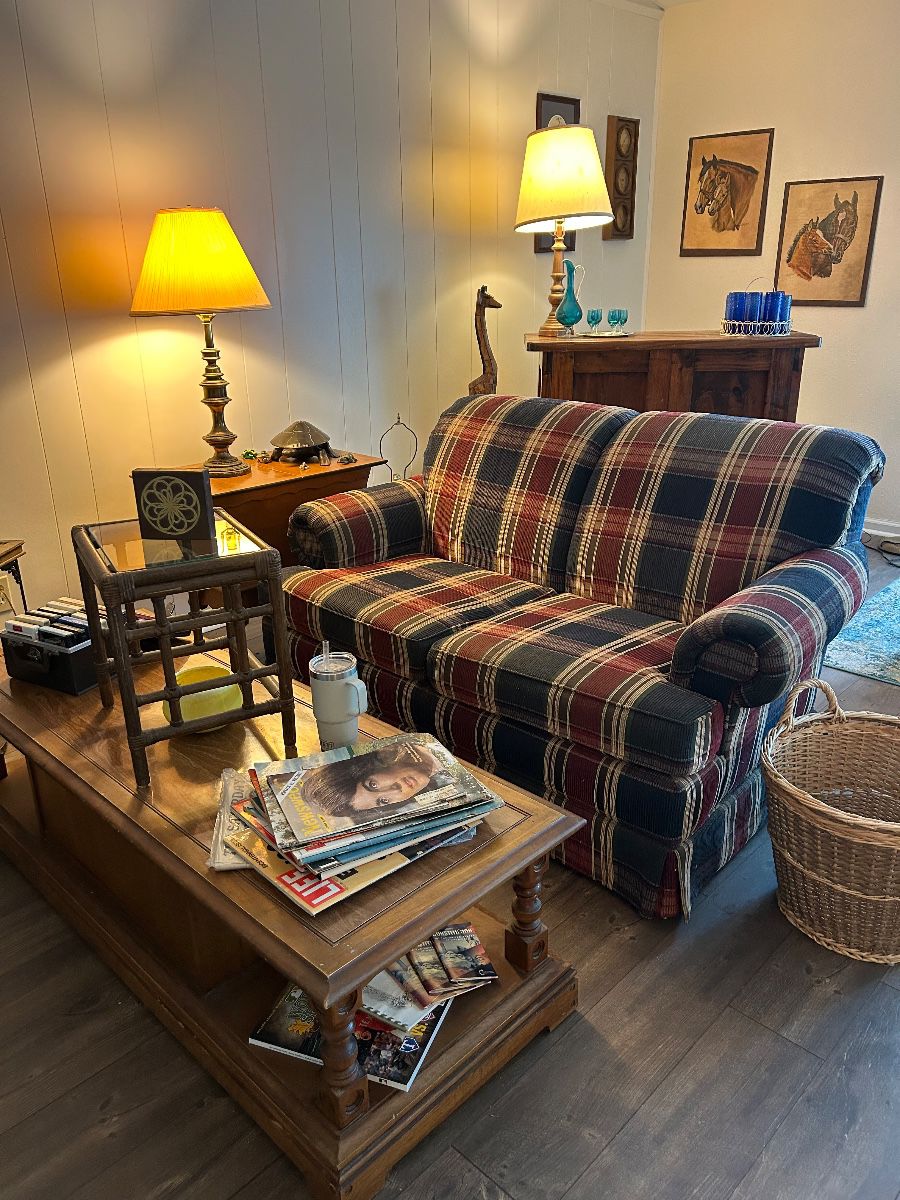 Plaid loveseat, coffee table, lamps, art & bar
