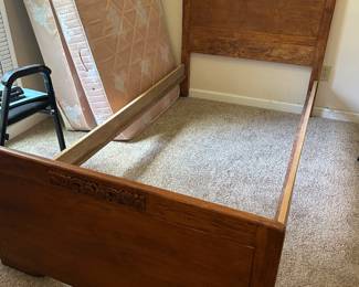 Early American carved bedframe with rails