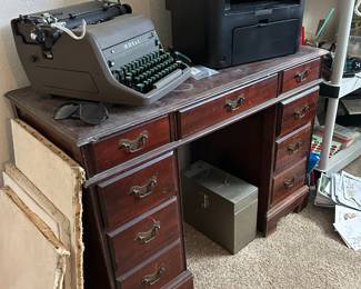 Desk, canvases, typewriter & printer