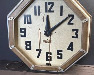 Circa 1920s octagonal New York City St. neon Clock