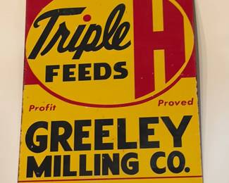 Vintage Triple H feeds metal sign