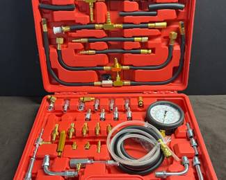 Pressure testing kit with multiple range of fittings
