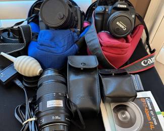 Canon Eds 40D,  Canon Eds 10D   with Lenses and carrying cases.  