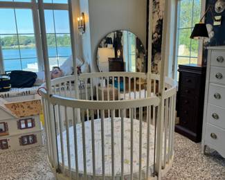 Adorable circular baby crib with canopy