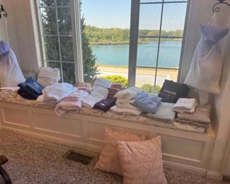 Lots of nice linens here! Several sets of bed linens for king size and queen size beds.