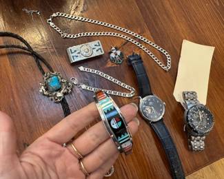 Native American sterling silver and turquoise bolo tie- Stunning! Gorgeous men's cuff, Native American Zuni sterling silver cuff bracelet with inlay Men's sterling silver link necklace and bracelet , others too. A cool compass necklace Orient Automatic Envoy men's watch with "open heart" on face Citizen Eco-Drive men's watch, radio controlled SkyHawk atomic chronograph world time Sterling silver Mexican money clip and others!