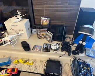 DJI Phantom 3 quadcopter drone Playstation 3, lots of ps2 games Playstation VR system