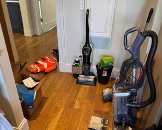 Tons of cleaning supplies, Bissell Crosswave, Shark vacuum buggy. Shark robot vacuum