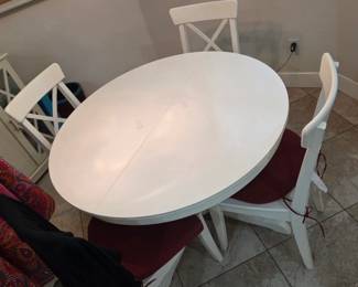 Wooden 44 inch Round Table with extra leaf and 6 chairs
