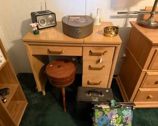 Vintage 1940-50 sewing machine in cabinet, typewriter and decor