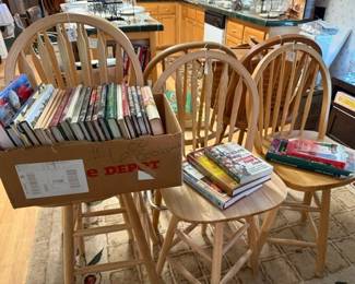 Oak barstools and chairs, cookbooks and reading books