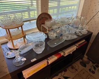 Glass bowls, cookbooks, entertainment table