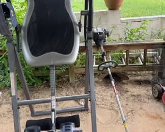 Inversion table and weedeater, large clay pots