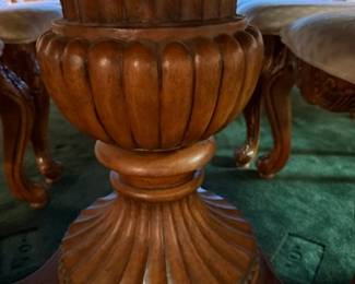 Base of wooden table for 10 with two leaves and 10 chairs