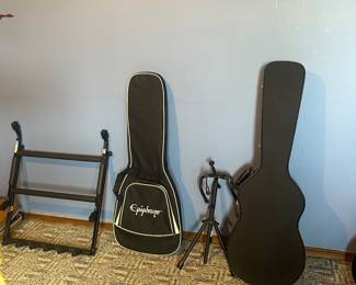 Guitars cases and stands 