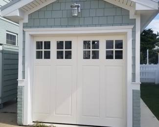 Brand new garage door with opener. Garage door is 7' x 8'