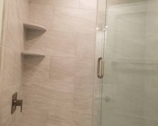 Barn-style shower doors; shower hardware