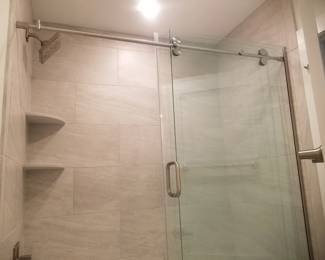 Barn-style shower doors are 58" wide x 5' tall