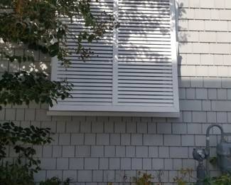 Metal plantation shutters
