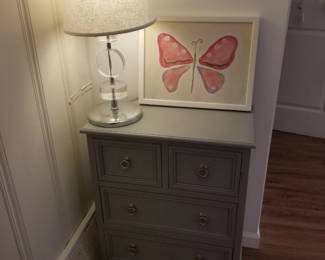 4-drawer dresser; table lamp