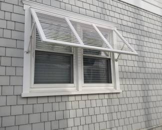 Windows; metal plantation shutters
