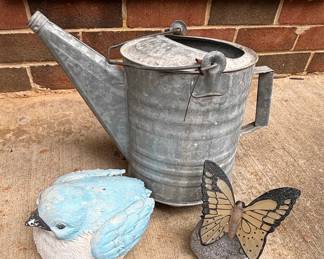 Vintage Galvanized Steel Watering Can with Decorative Garden Ornaments