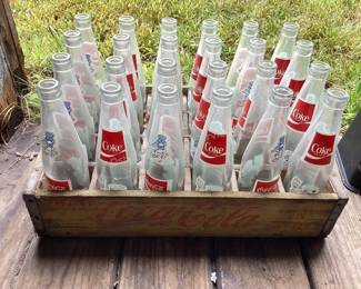 Coca-Cola bottles in crate