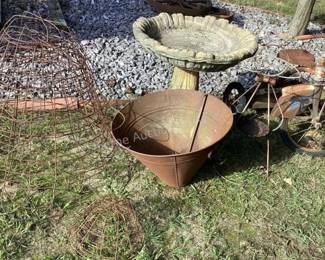 Wire baskets, cement birdbath & more