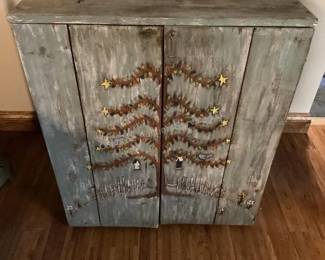 Barnwood cabinet with folk art painting