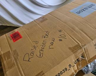 Raised garden bed- brand new. unassembled. All parts