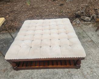 Tufted nail head ottoman. Cream suede like fabric