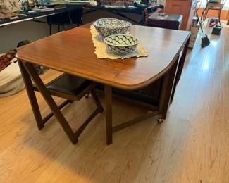 Walnut double drop leaf table and 4 padded chairs
