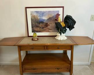 Drop Leaf Serving Cart with Rooster Figurine and Framed Landscape Art