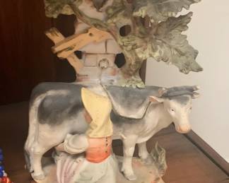 Antique Miking Cow and Maiden Statue