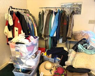 So many clothes, mens and womens, army, TWA flight attendent uniforms, etc