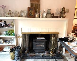 Even the fixtures are for sale, including this woodstove