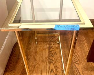 Brass side tables w/ glass insert tops 16” x 24” x 22”h $75e