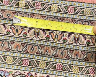 Backing of 17’ area rug.