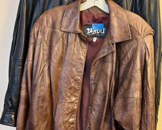 Andrew Marc black leather jacket sz “L” $150; women’s “S” Tabou brown leather jacket $80