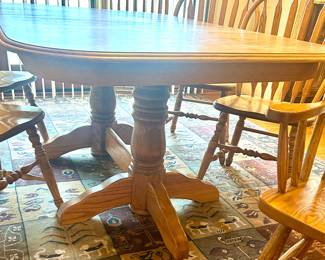 Amish made, double pedestal dining table w/ (3) leaves $250; 2 Arm Chairs, 4 upright Chairs $280