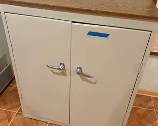 Metal 2 door Cabinet 36”w x 19d x 43”h $95