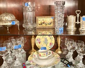 Bottom shelf: (1) 4pc crème Brûlée retired china set $40, wine glasses $5ea; top shelf: silver round footed covered cavier $30;silver 2 section utensil caddy $50