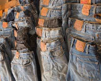 STACKS of Levi's men's 501s