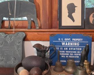 harmonicas, hand bells, porcelain sign