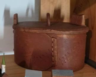 bentwood box , old red paint and poker decoration