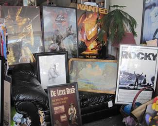 Assorted framed posters....Rocky.... Jurrasic park . ..James Bond...Shoeless Joe Jackson and others.