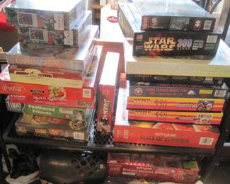 Assorted new in the boxes never opened puzzles