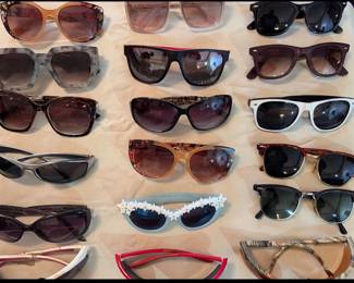 18 pairs of sunglasses